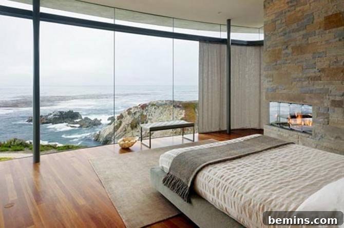 Coastal Bedroom with Floor-to-Ceiling Windows and Rocky Beach View