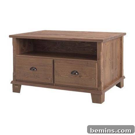 A wooden coffee table or TV bench with two drawers in the front.