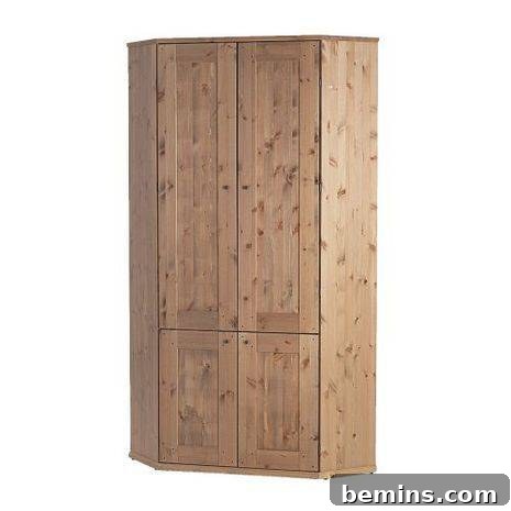 A cabinet is made out of light colored wood.