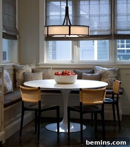 Upholstered bench used as a banquette alternative, offering flexibility and style without the commitment of a built-in.