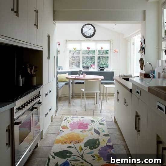 Narrow modern kitchen featuring a stylish banquette that maximizes space and adds a contemporary touch.