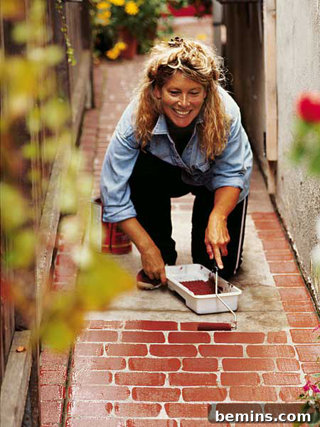 Concrete sidewalk transformed into a faux brick pathway