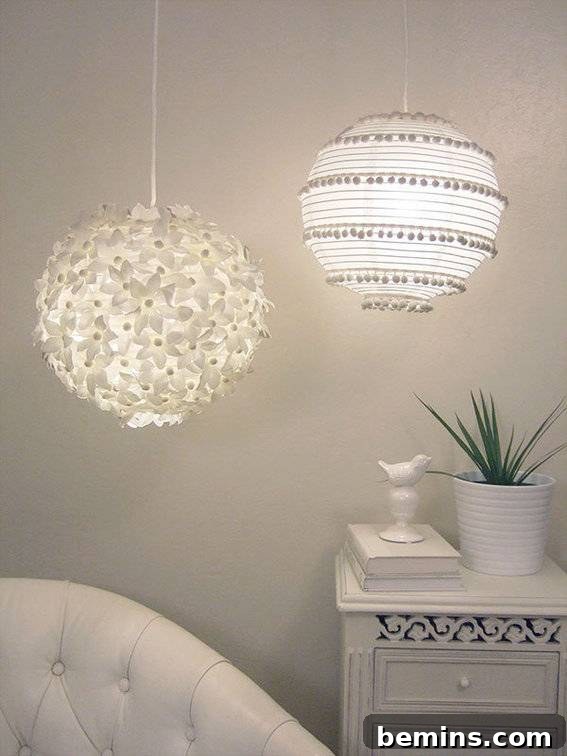 A paper lantern adorned with white flowers and playful pom-pom fringe, showcasing a whimsical and festive design.