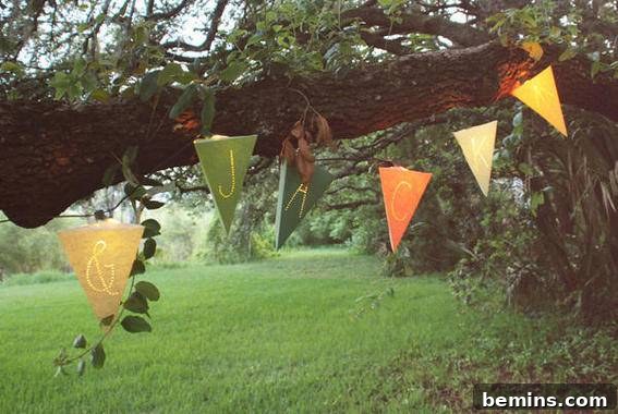 A close-up view of the lighted pennant garland, showcasing the details of the colorful paper pendants.