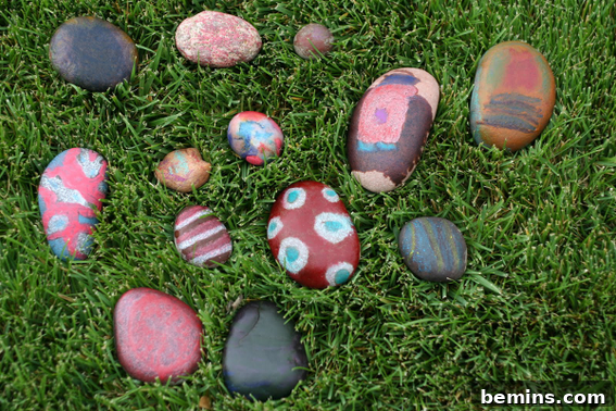 Ignite Creativity: Hot Rock Crayon Art for Endless Kid Fun 3 A collection of crayon rocks in various colors and patterns, showcasing the versatility of the craft