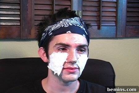 Original Title: Transform Yourself: An Easy Guide to Zombie Makeup 3 Applying toilet paper and liquid latex to cheeks