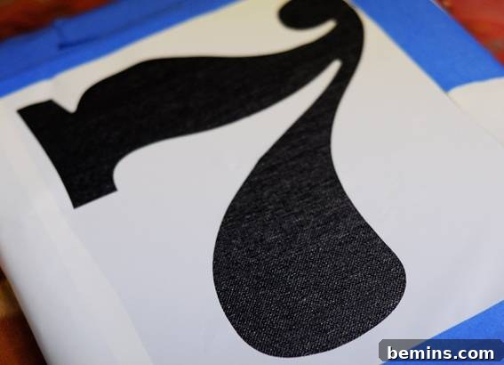 DIY Graphic Art on a Budget: Quick & Easy Projects 6 Affixing the stencil to the painted canvas