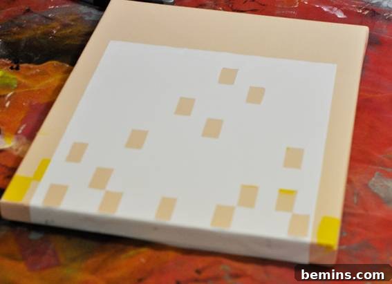 DIY Graphic Art on a Budget: Quick & Easy Projects 8 Finished spray paint art with a stenciled number