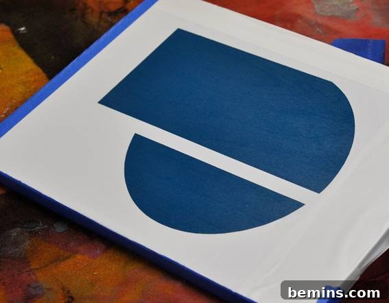 DIY Graphic Art on a Budget: Quick & Easy Projects 9 A dimensional letter J created using spray paint on plywood