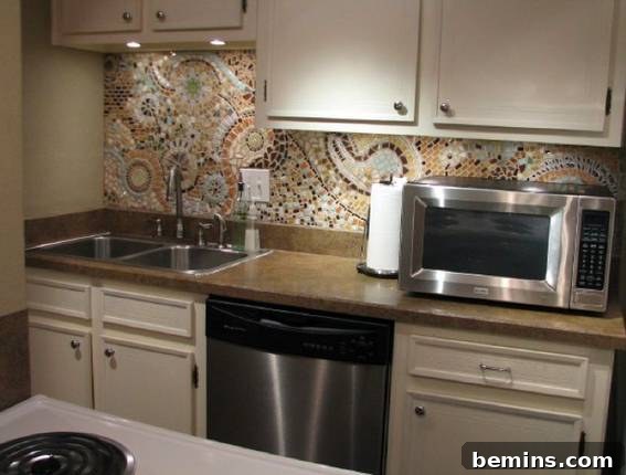 The completed mosaic kitchen backsplash