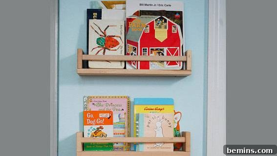 Ikea spice racks repurposed into book displays in a kids' room