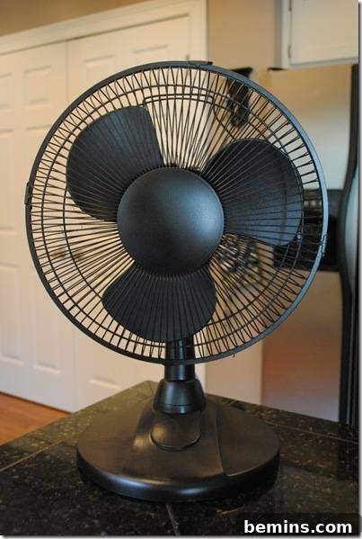 The fan displayed in a room setting.