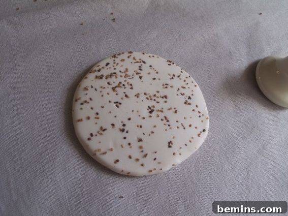 Forming the clay into a pancake