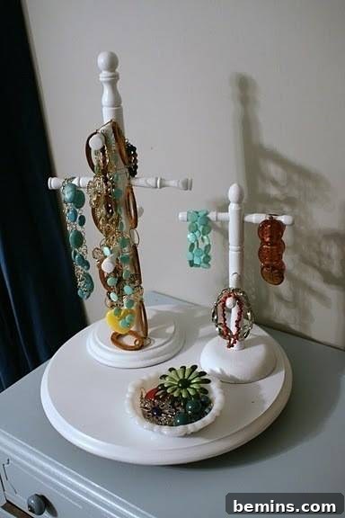 Mug holder turned jewelry holder. A mug holder repurposed to hang earrings and necklaces.