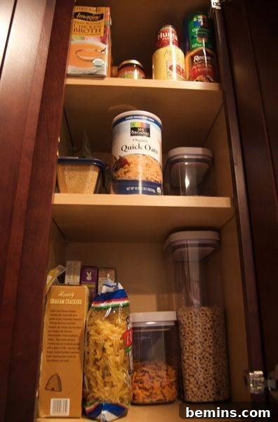 Kitchen items neatly organized inside the rack, maximizing space and accessibility.