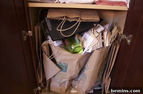 A chaotic collection of recyclables overflowing from a bin.