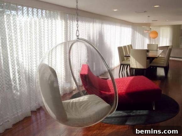 Bubble Chairs: A Pop of Whimsy for Your Space 7 Modern dining room featuring a suspended Bubble Chair