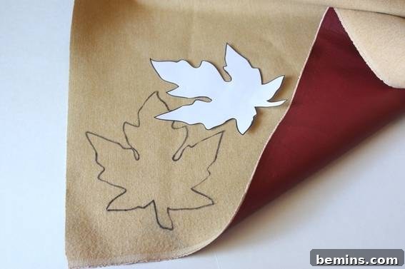Pile of cut faux leather leaves. Ready to be assembled into a beautiful table runner.