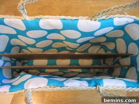The inside of a wicker bag with blue and white polka dot patterning.