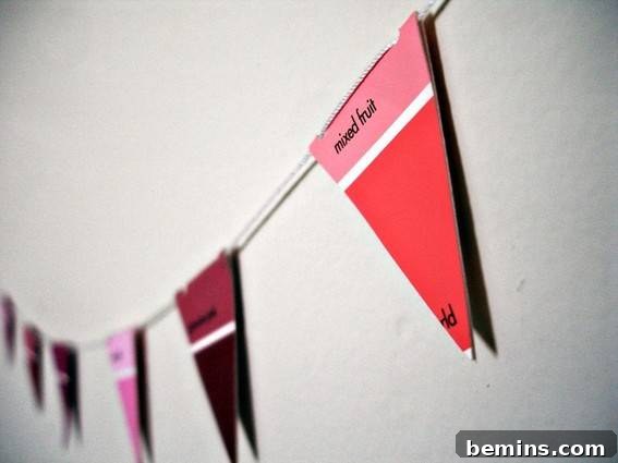 Creative Christmas: 8 DIY Paint Chip Card & Tag Projects 4 DIY Holiday Garland: A festive garland made from repurposed paint chips, offering a quick and easy way to add colorful cheer to your home decor.