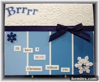 Creative Christmas: 8 DIY Paint Chip Card & Tag Projects 5 Handmade Holiday Greeting: A beautifully crafted blue and white Christmas card made with paint chips, perfect for expressing heartfelt holiday wishes.