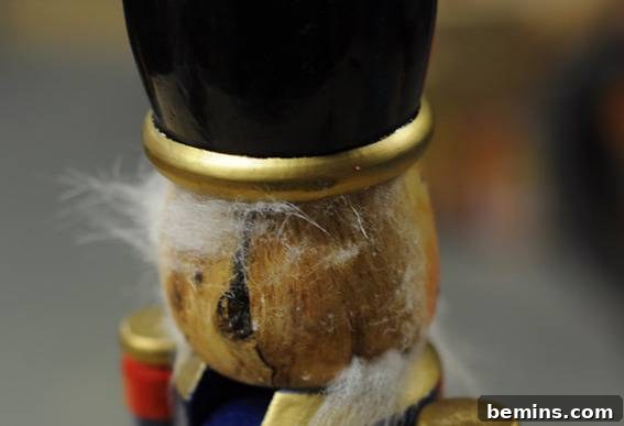 Craft Your Own Modern Minimalist Nutcracker 6 Sanding off the remnants of hair and beard from the nutcracker's face