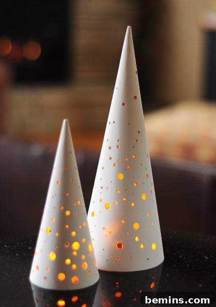 Crafting Contemporary Perforated Christmas Trees 7 Sanding the painted paper mache tree.