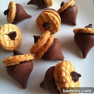 Chocolate cookie acorns on a table.