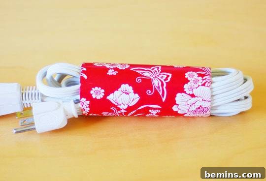 Curated Collection: 8 Chic DIY Wire & Cable Management Solutions 4 Toilet paper roll extension cord holder