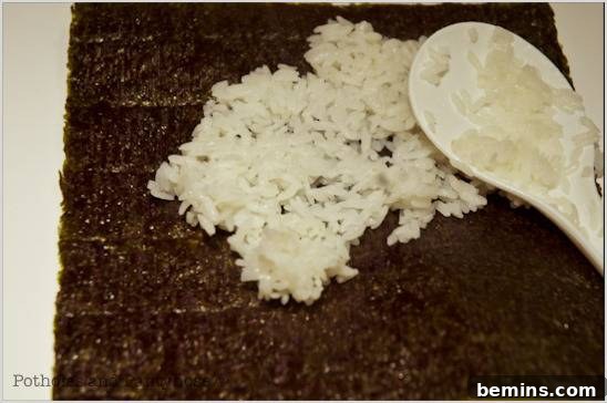 Sushi making with rice.