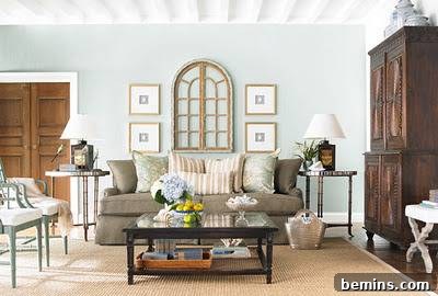 Flower vase kept on a glass table.