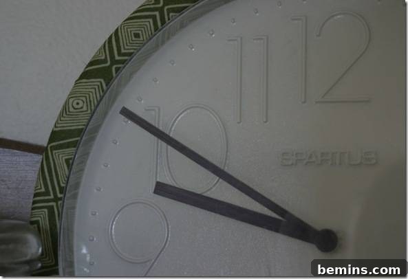 IMG_8637 - After shot of the round clock, now with an elegant fabric-covered frame.