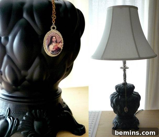 White lamp with black designer stand.