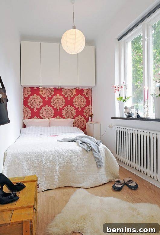 Tiny bedroom with color used as a headboard