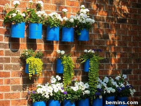 Wall of coffee can planters