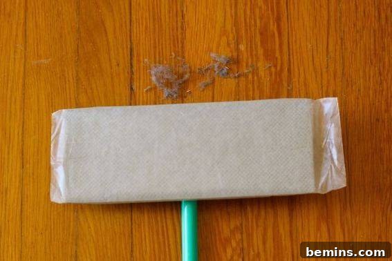 Does It Work Challenge Cleaning Floors with Wax Paper? Wax Paper Floor Cleaning The Ultimate Does It Work Test 4 Underside of wax paper after sweeping
