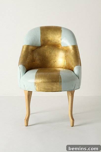 Close-up of the white and gold glam chair showcasing the details.