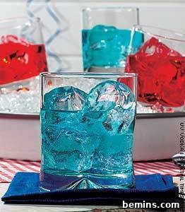 Stars, Stripes, and Sips: Festive Cocktails for Independence Day 2 Festive Fourth of July cocktails with red and blue ice.