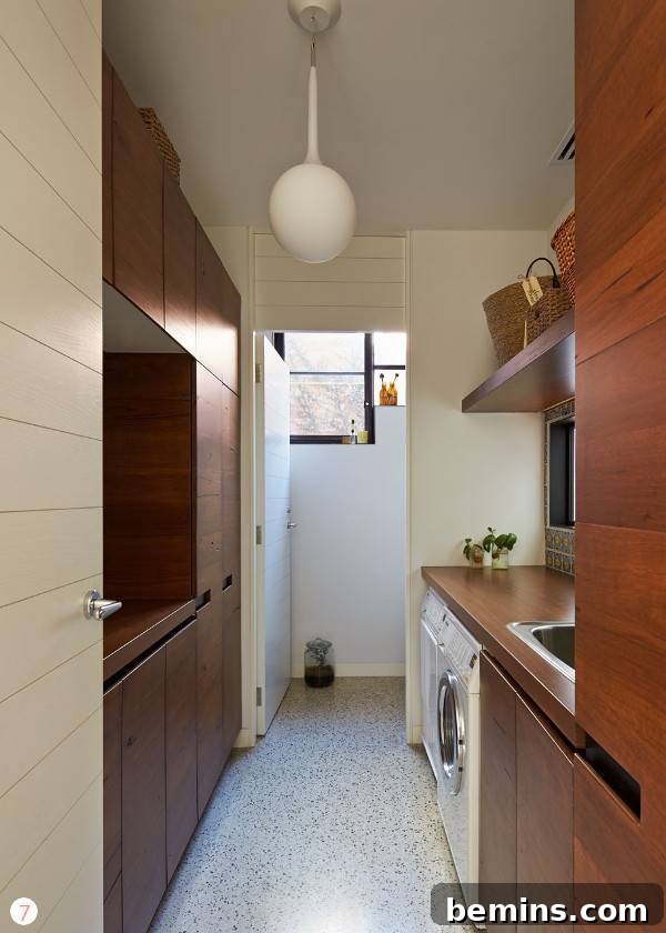 Top Laundry Room Transformations 16 Laundry room with walnut cabinets