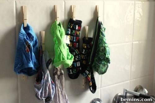 Top Laundry Room Transformations 45 Use clothes pins as drying hooks for socks