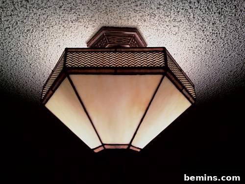 Another example of flush ceiling light accentuating popcorn texture