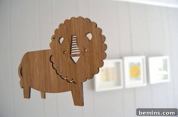 Baby mobile above the crib - A charming baby mobile hanging above the crib in the completed nursery.