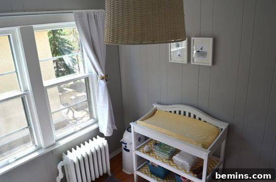 After makeover - Another view of the completed nursery makeover showcasing the gray and yellow accents.
