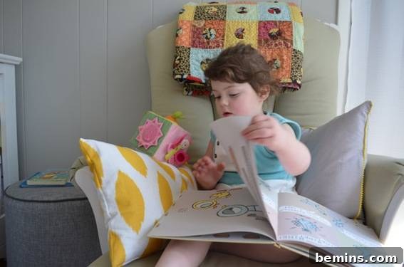 Ayla's new favorite place to read. - Ayla enjoying her new favorite reading spot in the transformed nursery.
