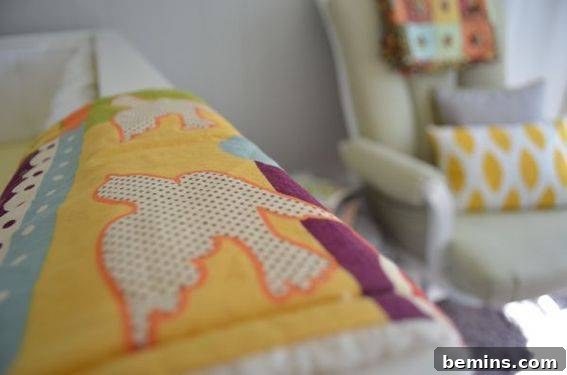 Burp cloth - Details of the nursery decor including a colorful burp cloth.