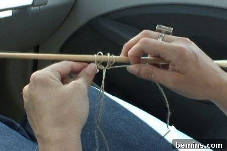 Twisting hemp twine around a stick