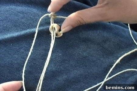 Hands holding hemp twine