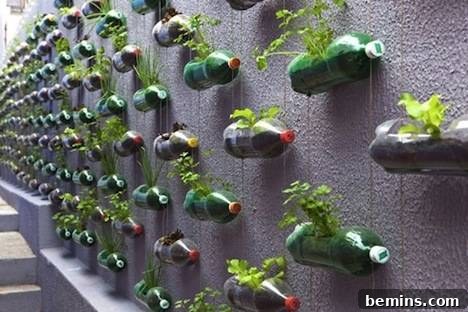 A wall covered in plastic bottle planters.