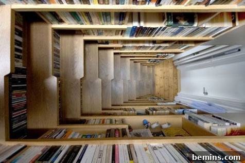 Stairwell lined with bookshelves