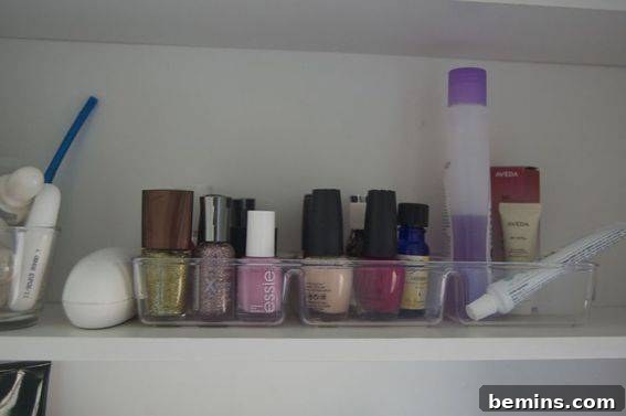 Organized bathroom supplies in clear bins